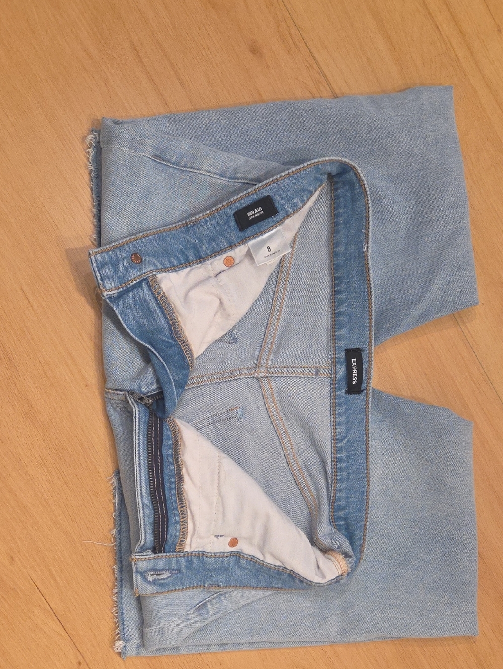 High Waisted Light Wash Ripped Relaxed Straight Jeans